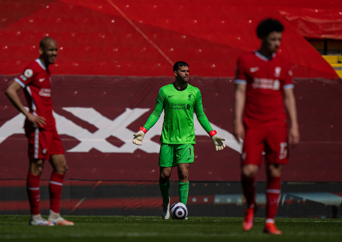 Liverpool's goalkeeper Alisson Becker looks dejected after his side concede a 95th minute equalising goal during the FA Premier League match between Liverpool FC and Newcastle United FC at Anfield.