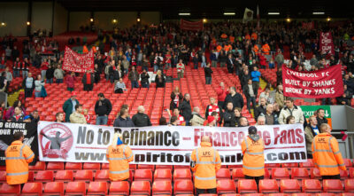 October 3, 2010: Liverpool supporters protest against American co-owners Tom Hicks and George N. Gillett Jr. after the side's embarrassing 2-1 defeat at home to Blackpool during the Premiership match at Anfield.