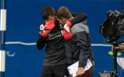 Liverpool's goalkeeper Alisson Becker with goalkeeping coach John Achterberg after scoring the winning goal in injury time during the FA Premier League match against West Brom