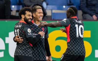 Liverpool's Roberto Firmino (C) celebrates with team-mates Mohamed Salah (L) and Sadio Mane (R) after scoring the first goal during the FA Premier League match between Burnley FC and Liverpool FC at Turf Moor