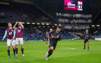 Liverpool's Alex Oxlade-Chamberlain celebrates after scoring the third goal during the FA Premier League match between Burnley FC and Liverpool FC at Turf Moor.