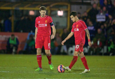 Liverpool's captain Steven Gerrard and Philippe Coutinho Correia look dejected as AFC Wimbledon score the opening goal during the FA Cup 3rd Round match at the Kingsmeadow Stadium