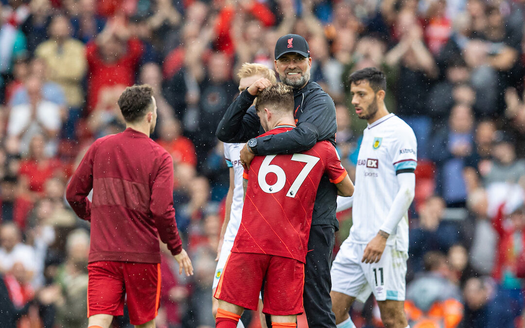 Liverpool's manager Jürgen Klopp embraces Harvey Elliott after the FA Premier League match between Liverpool FC and Burnley FC at Anfield