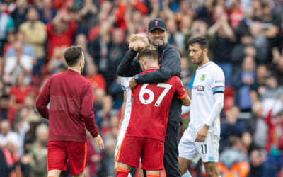 Liverpool's manager Jürgen Klopp embraces Harvey Elliott after the FA Premier League match between Liverpool FC and Burnley FC at Anfield