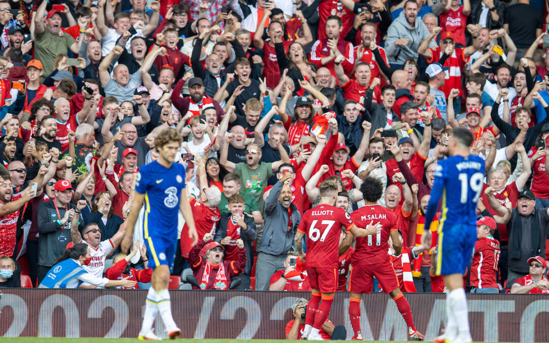 Liverpool's Mohamed Salah celebrates after scoring the first goal during the FA Premier League match between Liverpool FC and Chelsea FC at Anfield