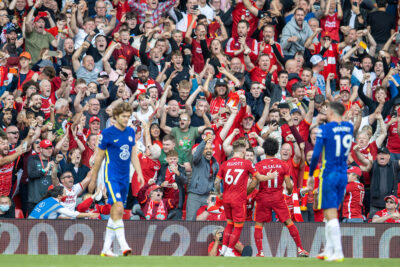 Liverpool's Mohamed Salah celebrates after scoring the first goal during the FA Premier League match between Liverpool FC and Chelsea FC at Anfield