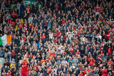 Liverpool supporters applaud the team after the FA Premier League match between Liverpool FC and Burnley FC at Anfield