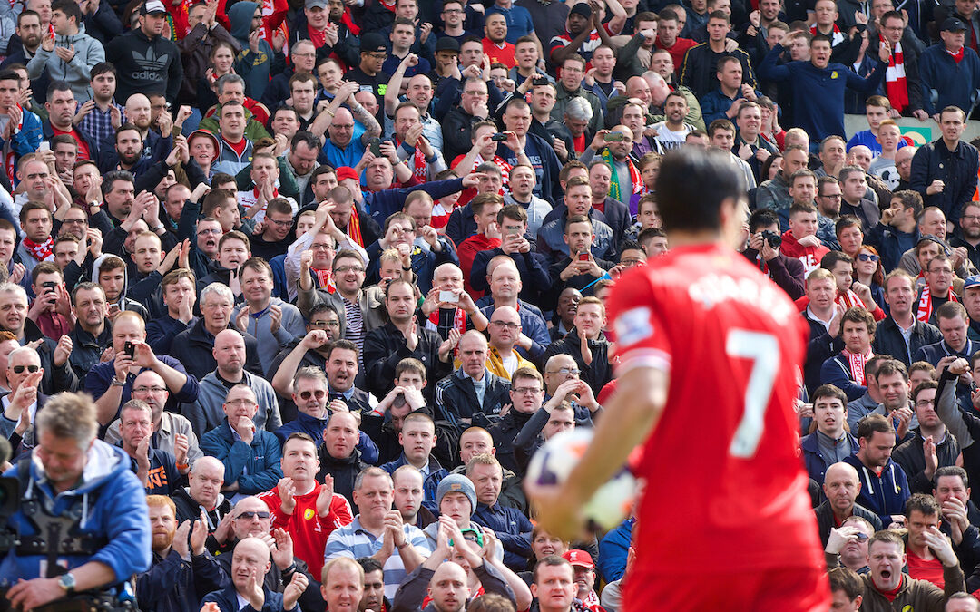 Liverpool supporters cheer on Luis Suarez against Norwich City during the Premiership match at Carrow Road