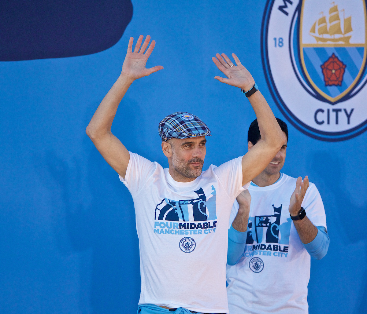 Manchester City's manager Pep Guardiola on stage after an open-top bus parade through the city after winning a domestic treble of FA Premier League, Football League Cup and FA Cup trophies