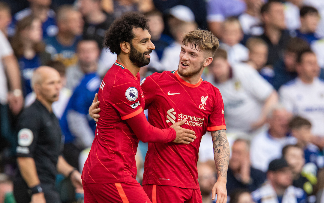 Liverpool's Mohamed Salah celebrates with team-mate Harvey Elliott after scoring the first goal during the FA Premier League match between Leeds United FC and Liverpool FC at Elland Road