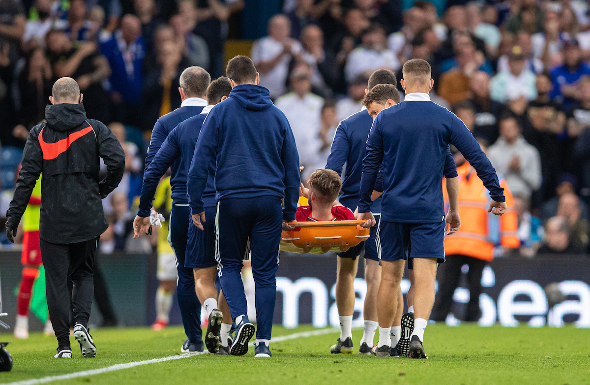 Liverpool's Harvey Elliott is carried off injured during the FA Premier League match between Leeds United FC and Liverpool FC at Elland Road