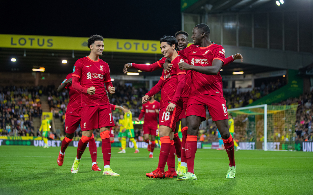 Liverpool's Takumi Minamino (C) celebrates with team-mates after scoring the first goal during the Football League Cup 3rd Round match between Norwich City FC and Liverpool FC at Carrow Road