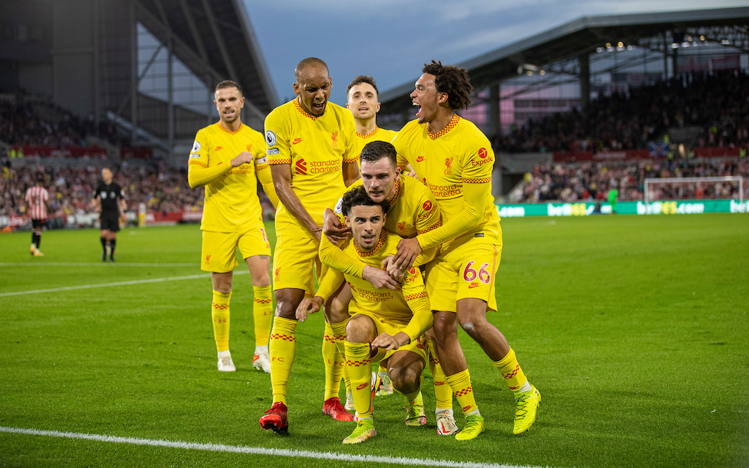 Liverpool's Curtis Jones (C) celebrates with team-mates after scoring the third goal during the FA Premier League match between Brentford FC and Liverpool FC at the Brentford Community Stadium