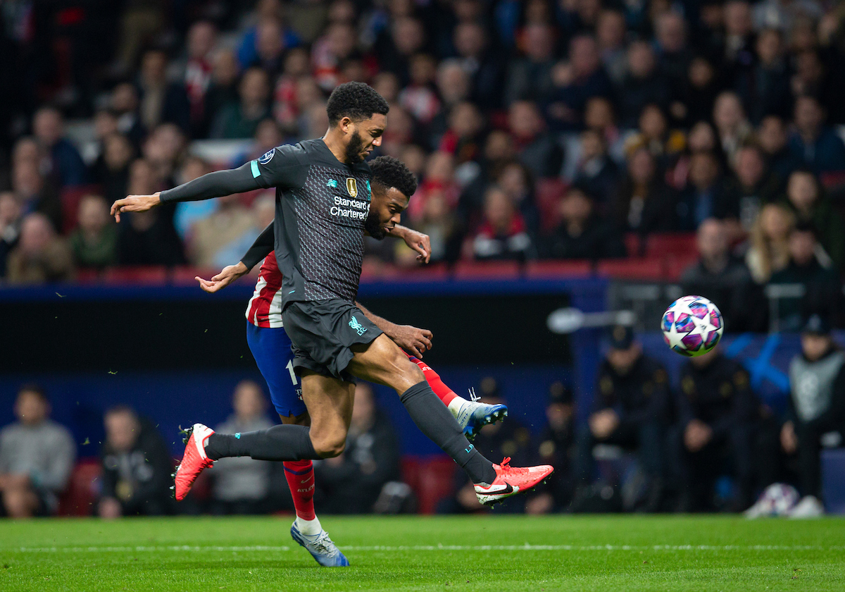 Liverpool's Joe Gomez (L) and Club Atlético de Madrid's Thomas Lemar during the UEFA Champions League Round of 16 1st Leg match between Club Atlético de Madrid and Liverpool FC at the Estadio Metropolitano