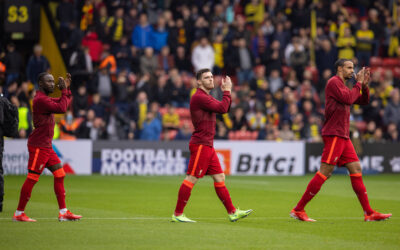 Liverpool's Naby Keita, Andy Robertson and Joel Matip applaud the travelling supporters as they walk out before the FA Premier League match between Watford FC and Liverpool FC at Vicarage Road