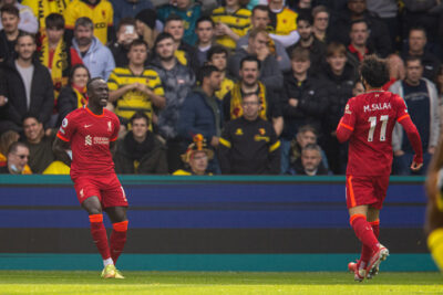Liverpool's Sadio Mané celebrates after scoring the first goal, his 100th Premier League goal, during the FA Premier League match between Watford FC and Liverpool FC at Vicarage Road