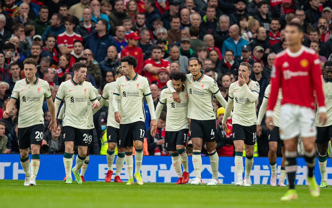 Liverpool's Mohamed Salah celebrates with team-mate Virgil van Dijk after scoring the third goal, the first of his hat-trick, during the FA Premier League match between Manchester United FC and Liverpool FC at Old Trafford