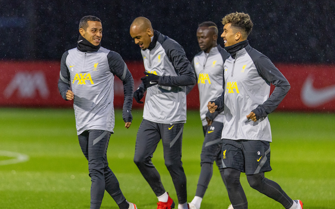 Liverpool's Thiago Alcantara (L) and Roberto Firmino (R) during a training session at the AXA Training Centre ahead of the UEFA Champions League Group B Matchday 4 game between Liverpool FC and Club Atlético de Madrid