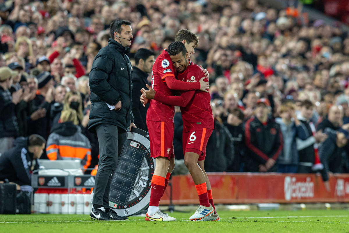 Liverpool's substitute Tyler Morton (L) makes his League debut replacing Thiago Alcantara during the FA Premier League match between Liverpool FC and Arsenal FC at Anfield