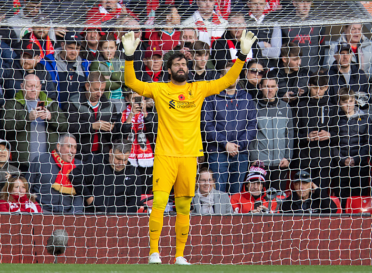 Liverpool's goalkeeper Alisson Becker prays before the FA Premier League match between Liverpool FC and Brighton & Hove Albion FC at Anfield