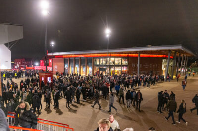 Liverpool supporters queue to enter the ground during the FA Premier League match between Liverpool FC and Newcastle United FC at Anfield