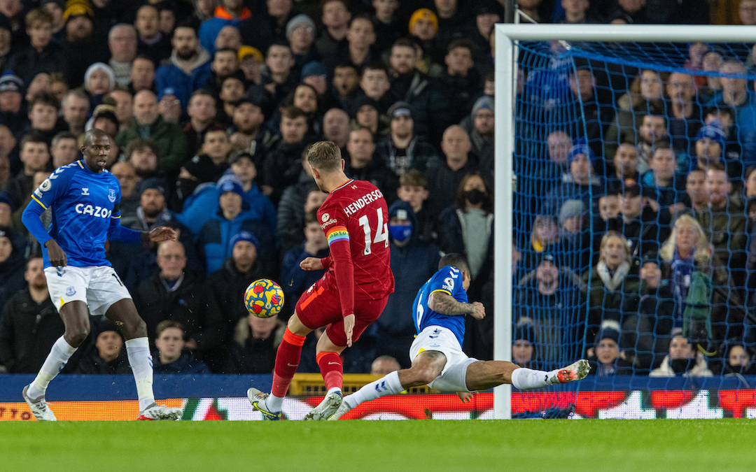 Liverpool's captain Jordan Henderson scores the first goal during the FA Premier League match between Everton FC and Liverpool FC, the 239th Merseyside Derby, at Goodison Park