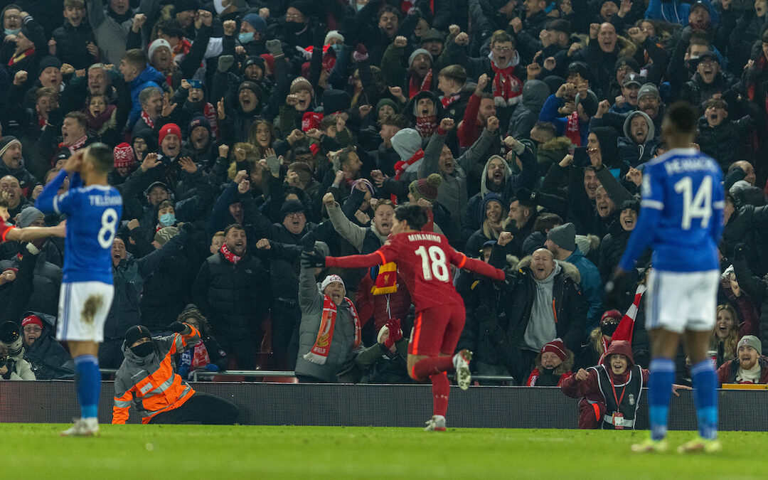 Liverpool's Takumi Minamino celebrates after scoring the third goal to level the score at 3-3 in the 96th minute during the Football League Cup Quarter-Final match between Liverpool FC and Leicester City FC at Anfield