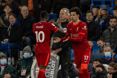 Liverpool's Sadio Mané (L) is replaced by substitute Curtis Jones during the FA Premier League match between Chelsea FC and Liverpool FC at Stamford Bridge