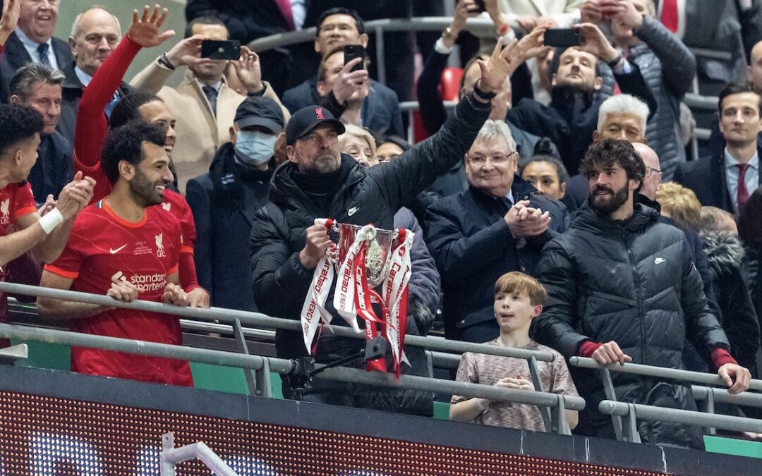 Liverpool's manager Jürgen Klopp lifts the trophy as his side celebrate winning the Football League Cup Final match between Chelsea FC and Liverpool FC at Wembley Stadium