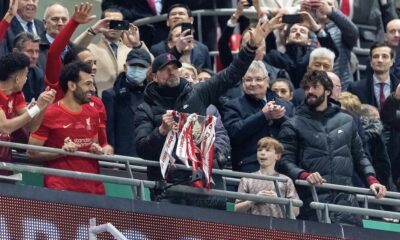 Liverpool's manager Jürgen Klopp lifts the trophy as his side celebrate winning the Football League Cup Final match between Chelsea FC and Liverpool FC at Wembley Stadium