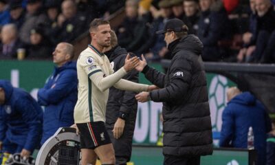 Liverpool's captain Jordan Henderson shakes hands with manager Jürgen Klopp as he substituted during the FA Premier League match between Burnley FC and Liverpool FC at Turf Moor