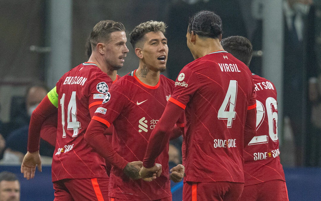 Liverpool's Roberto Firmino (L) celebrates with team-mate Virgil van Dijk after scoring the first goal during the UEFA Champions League Round of 16 1st Leg game between FC Internazionale Milano and Liverpool FC at the Stadio San Siro