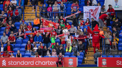 Liverpool supporter sing "You'll Never Walk Alone" during the FA Women’s Championship Round 4 match between Liverpool FC Women and Crystal Palace FC Women at Prenton Park