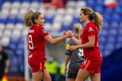 Liverpool's Liverpool's Katie Stengel (R) celebrates with team-mate Leanne Kiernan after the third goal during the Women’s FA Cup 4th Round match between Liverpool FC Women and Lincoln City Women FC at Prenton Park
