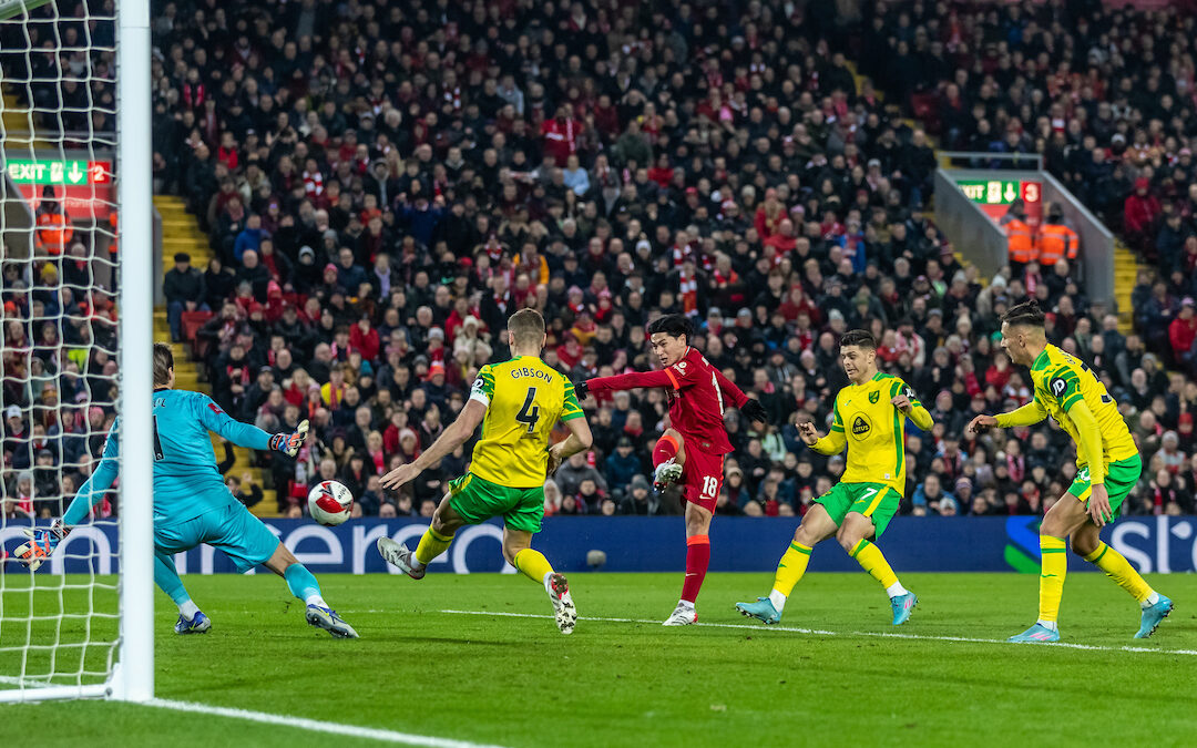 Liverpool's Takumi Minamino scores the first goal during the FA Cup 5th Round match between Liverpool FC and Norwich City FC at Anfield