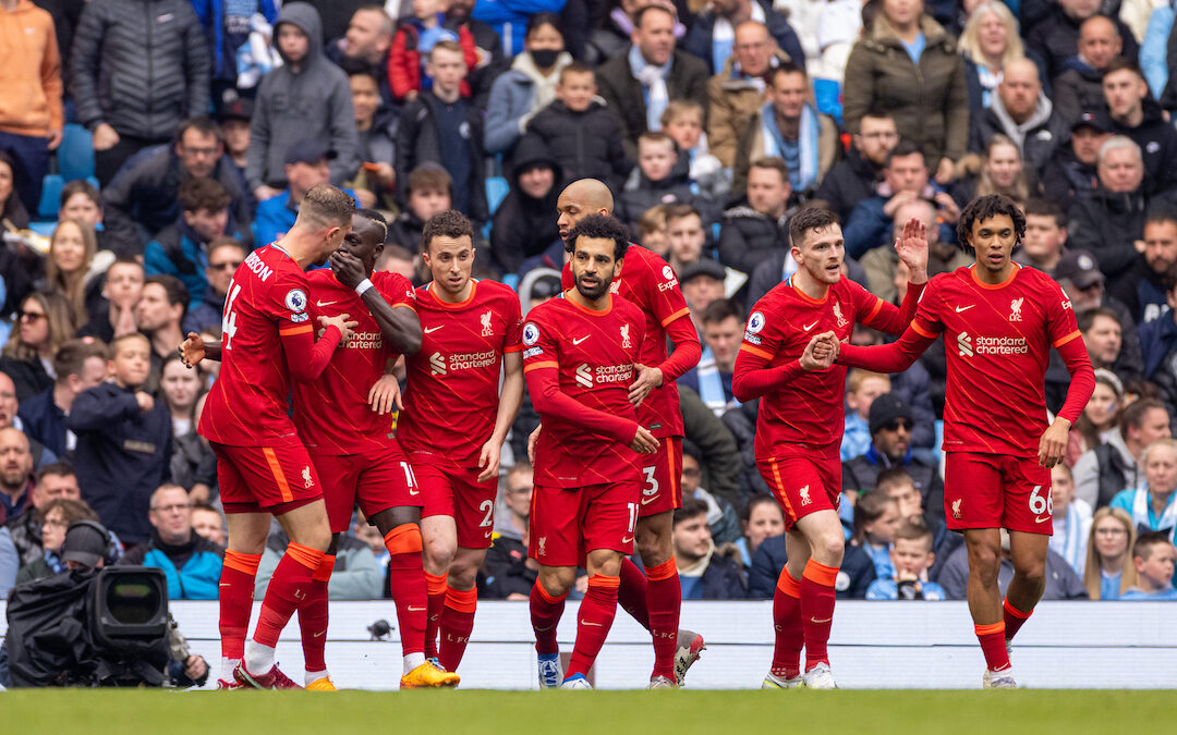 Diogo Jota (3rd from L) celebrates with team-mates after scoring his side's first equalising goal during the FA Premier League match between Manchester City FC and Liverpool FC at the Etihad Stadium