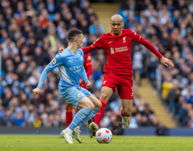 Liverpool's Fabio Henrique Tavares 'Fabinho' (R) challenges Manchester City's Phil Foden during the FA Premier League match between Manchester City FC and Liverpool FC at the City of Manchester Stadium