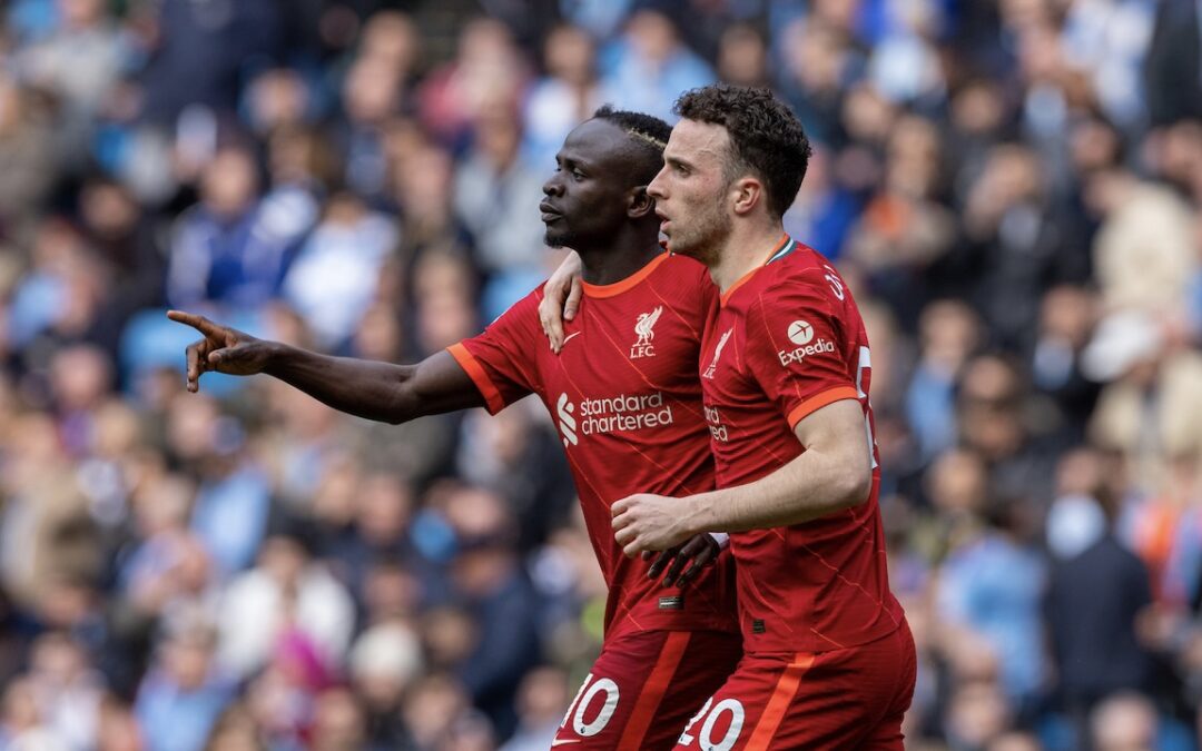 Liverpool's Sadio Mané (L) celebrates with team-mate Diogo Jota after scoring the second goal during the FA Premier League match between Manchester City FC and Liverpool FC at the City of Manchester Stadium
