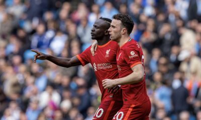 Liverpool's Sadio Mané (L) celebrates with team-mate Diogo Jota after scoring the second goal during the FA Premier League match between Manchester City FC and Liverpool FC at the City of Manchester Stadium