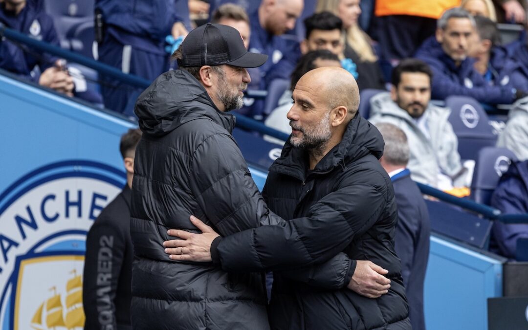 Manchester City's manager Josep 'Pep' Guardiola (R) embraces Liverpool's manager Jürgen Klopp before the FA Premier League match between Manchester City FC and Liverpool FC at the City of Manchester Stadium