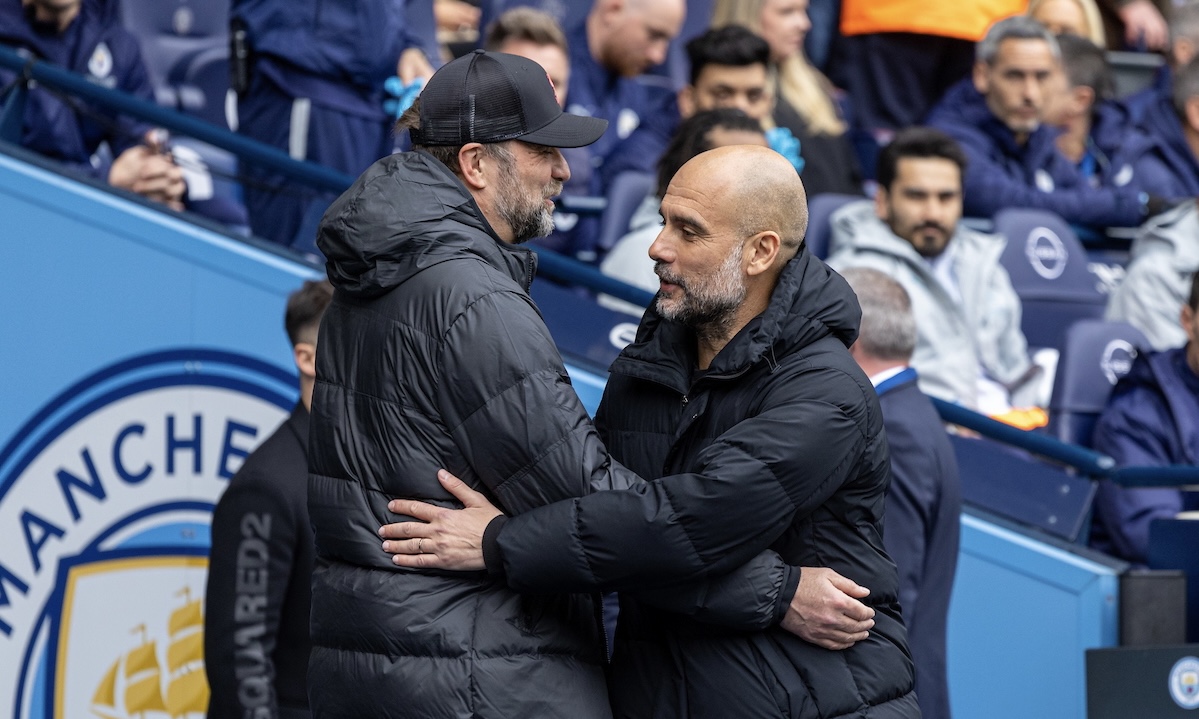 Manchester City's manager Josep 'Pep' Guardiola (R) embraces Liverpool's manager Jürgen Klopp before the FA Premier League match between Manchester City FC and Liverpool FC at the City of Manchester Stadium