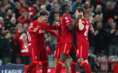 Roberto Firmino of Liverpool celebrates with teammates after scoring their team's third goal during the UEFA Champions League Quarter Final Leg Two match between Liverpool FC and SL Benfica at Anfield