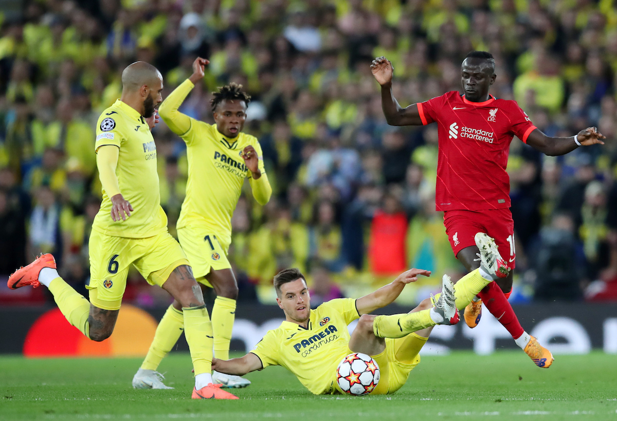 Sadio Mane of Liverpool is challenged by Giovani Lo Celso of Villarreal CF during the UEFA Champions League Semi Final Leg One match between Liverpool and Villarreal at Anfield