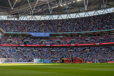 Manchester City and Liverpool players stand to remember the 97 victims of the Hillsborough Stadium Disaster before the FA Cup Semi-Final game between Manchester City FC and Liverpool FC at Wembley Stadium