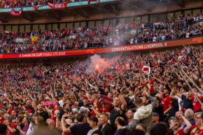 Liverpool supporters celebrate after the FA Cup Semi-Final game between Manchester City FC and Liverpool FC at Wembley Stadium