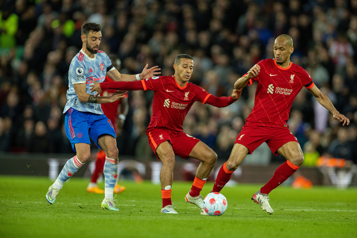 Liverpool's Thiago Alcântara (C) and Fabio Henrique Tavares 'Fabinho' (R) with Manchester United's Bruno Fernandes during the FA Premier League match between Liverpool FC and Manchester United FC at Anfield