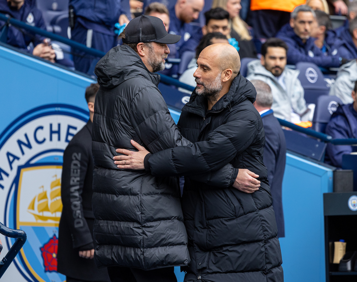 Manchester City's manager Josep 'Pep' Guardiola (R) embraces Liverpool's manager Jürgen Klopp before the FA Premier League match between Manchester City FC and Liverpool FC at the City of Manchester Stadium. The game ended in a 2-2 draw.