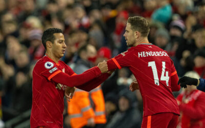 Liverpool's Thiago Alcantara hands the captain's armband to Jordan Henderson during the FA Premier League match between Liverpool FC and Leeds United FC at Anfield