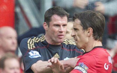 Liverpool's Jamie Carragher pushes aside Manchester United's argumentative Gary Neville during the Premiership match at Old Trafford