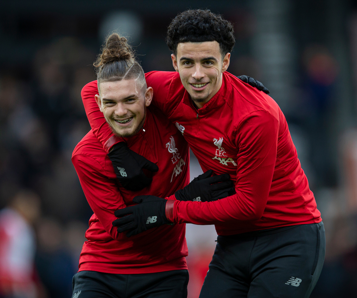 Liverpool's substitutes Harvey Elliott (L) and Curtis Jones during the pre-match warm-up before the FA Premier League match between AFC Bournemouth and Liverpool FC at the Vitality Stadium